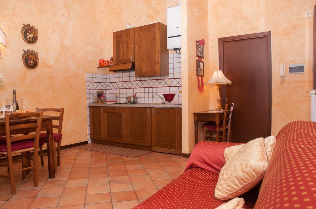 Апартаменты Residenza Il Palazzo Кастильоне-дель-Лаго Номер фото